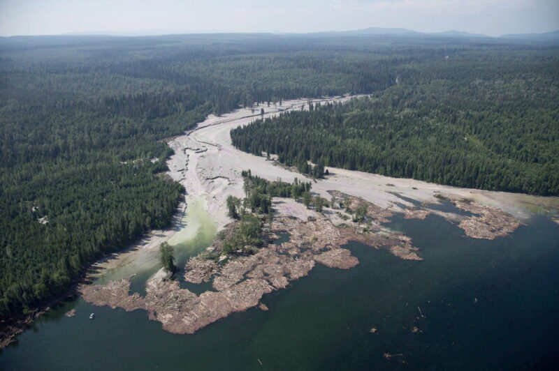 Aerial view of liquid mining waste flowing down Hazleton Creek into the Quesnel Lake.