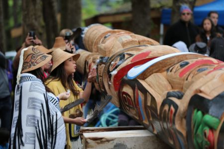 Haida totem pole raising