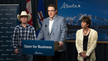 Minister of Environment and Parks Jason Nixon (middle), Minister of Energy Sonya Savage and Minister of Agriculture and Forestry Devin Dreeshen