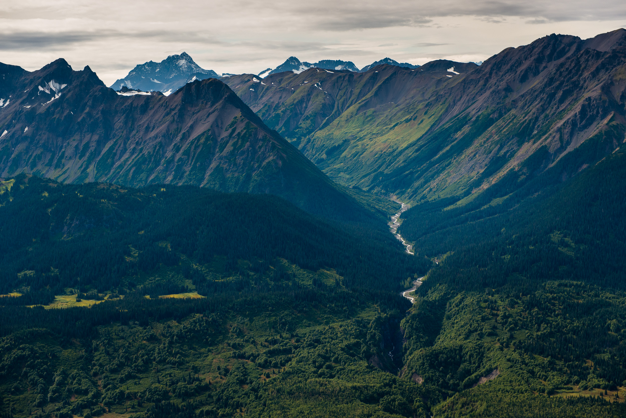 mountain range with river running through