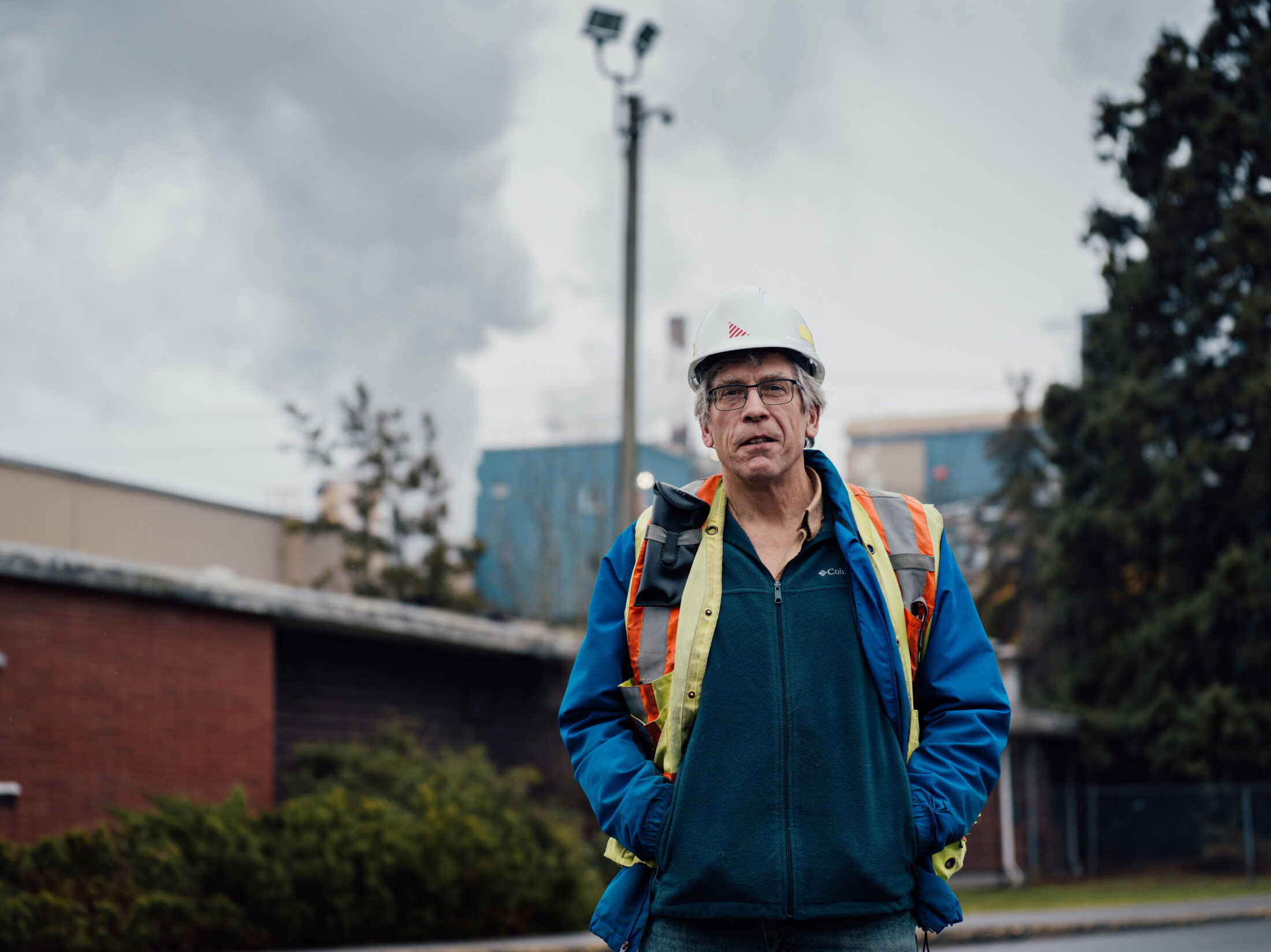 Brian Houle stands in front of the Catalylst Pulp and Paper mill