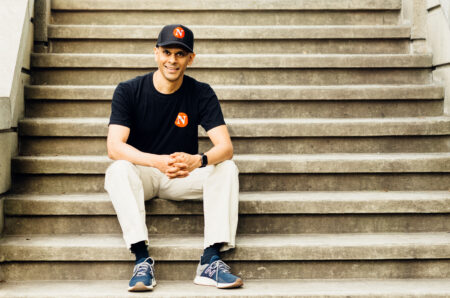 mike de souza sitting on some steps