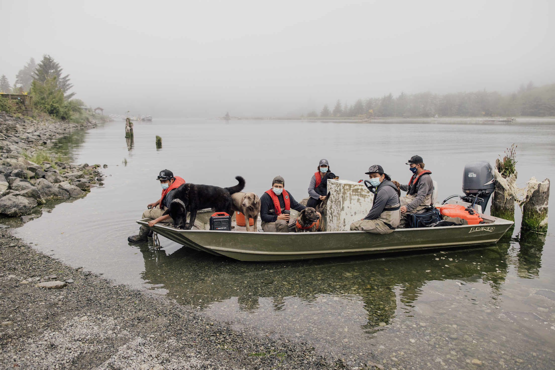 Group of Pacheedaht youth take a group boat ride to a salmon reclaimation project