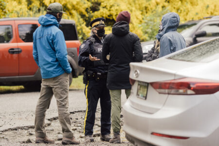 Sgt. Elenore Sturko explains to media some of the contraptions protestors are using