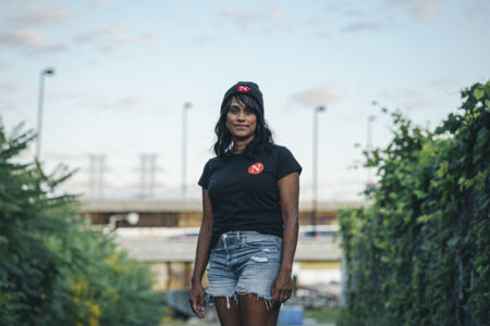 Denise Balkissoon poses for a portrait outdoors