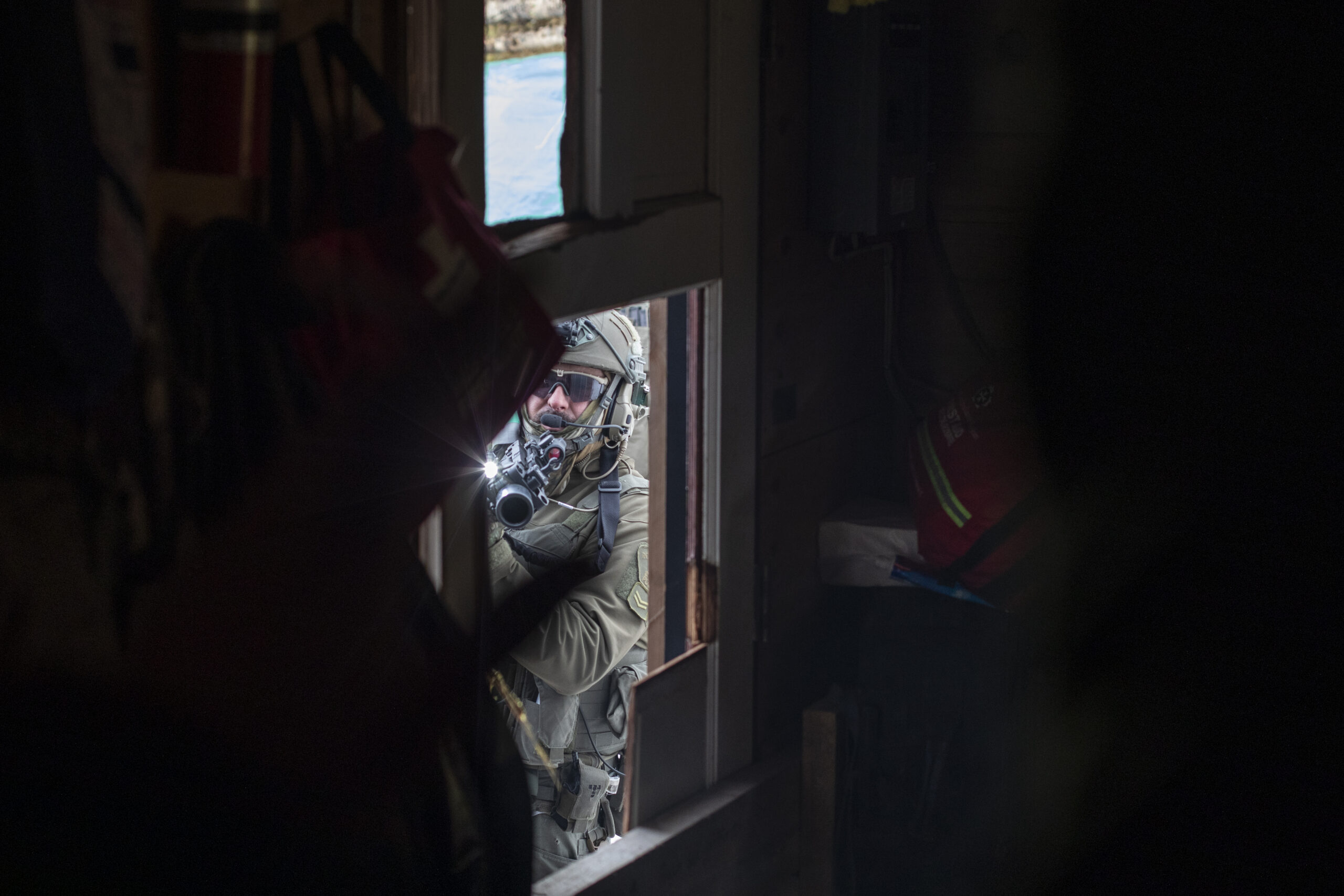 Militarized RCMP breach a locked tiny house with axes and chainsaws on Wet'suwet'en territory