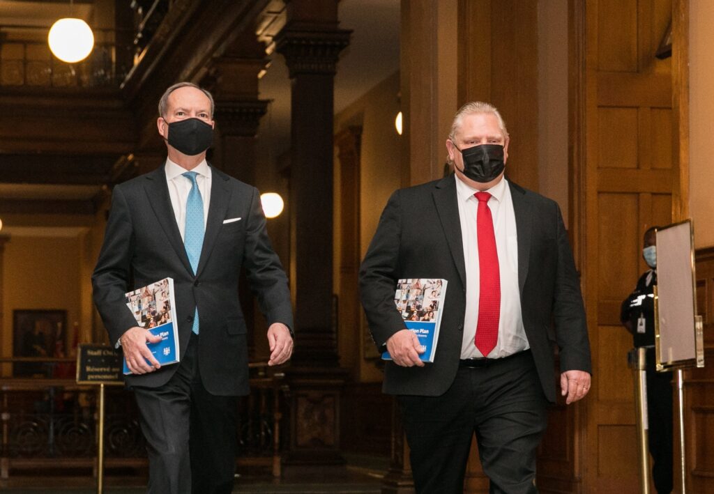 Finance Minister Peter Bethlenfalvy, left, and Premier Doug Ford, right, at Queen's Park 