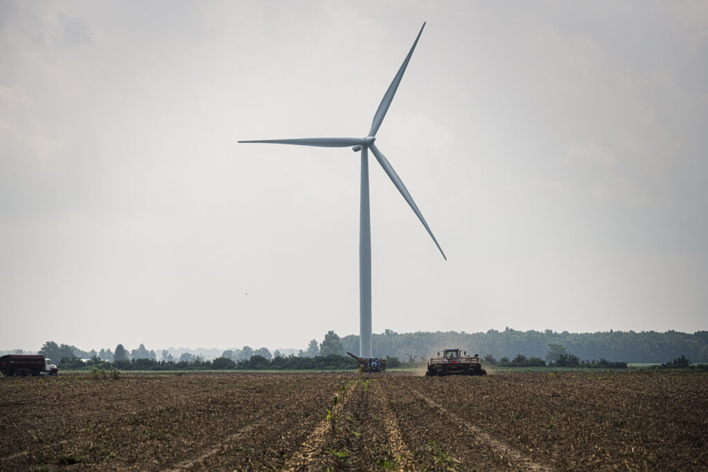 A photo of a wind turbine in the middle of a farmer's field in Leamington, Ont.