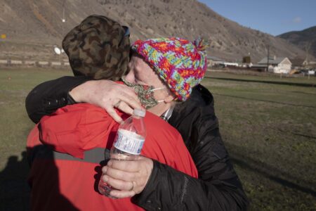 Prabhjot Kaur Dhillon hugs her friend in the aftermath of B.C.'s devastating floods