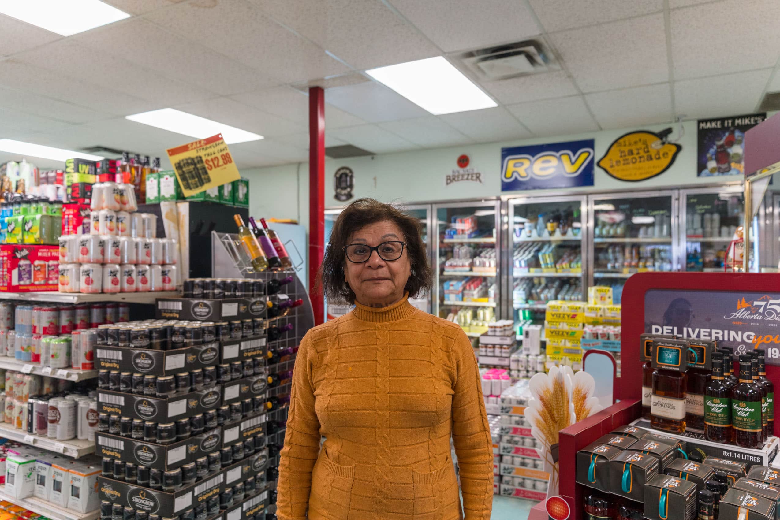 In Airdrie, Alberta: Zubeda Jessa stands inside her family's liquor store