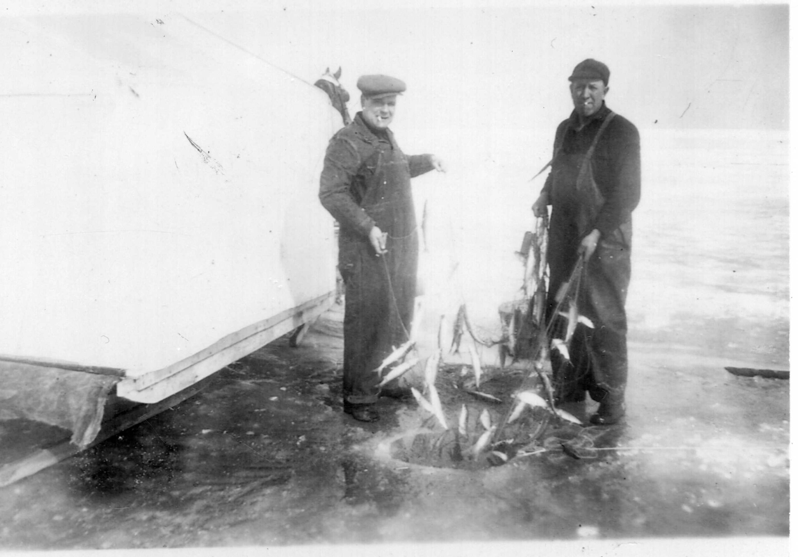 Members of the Weston family from the Bay Mills Indian Community ice fishing at the mouth of the St. Mary’s River in Michigan, in the 1930s.