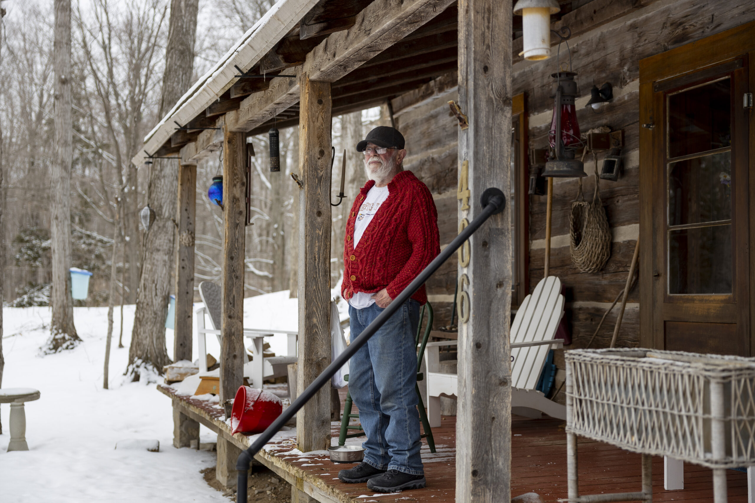Don Kennedy, 80, stands for a photograph on the front porch of the family home in Sauble Beach