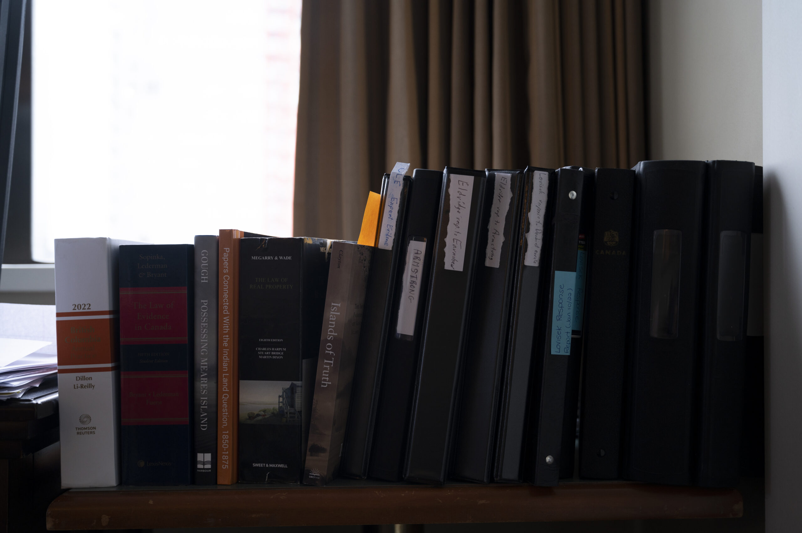 Books in hotel room of Jack Woodward, lawyer for Nuchatlaht Indigenous rights and title case