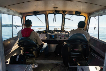 Wuikinuxv Guardian Watchmen Adam Nelson and Corey Hanuse pilot their boat out of Rivers Inlet as part of their regular patrol.