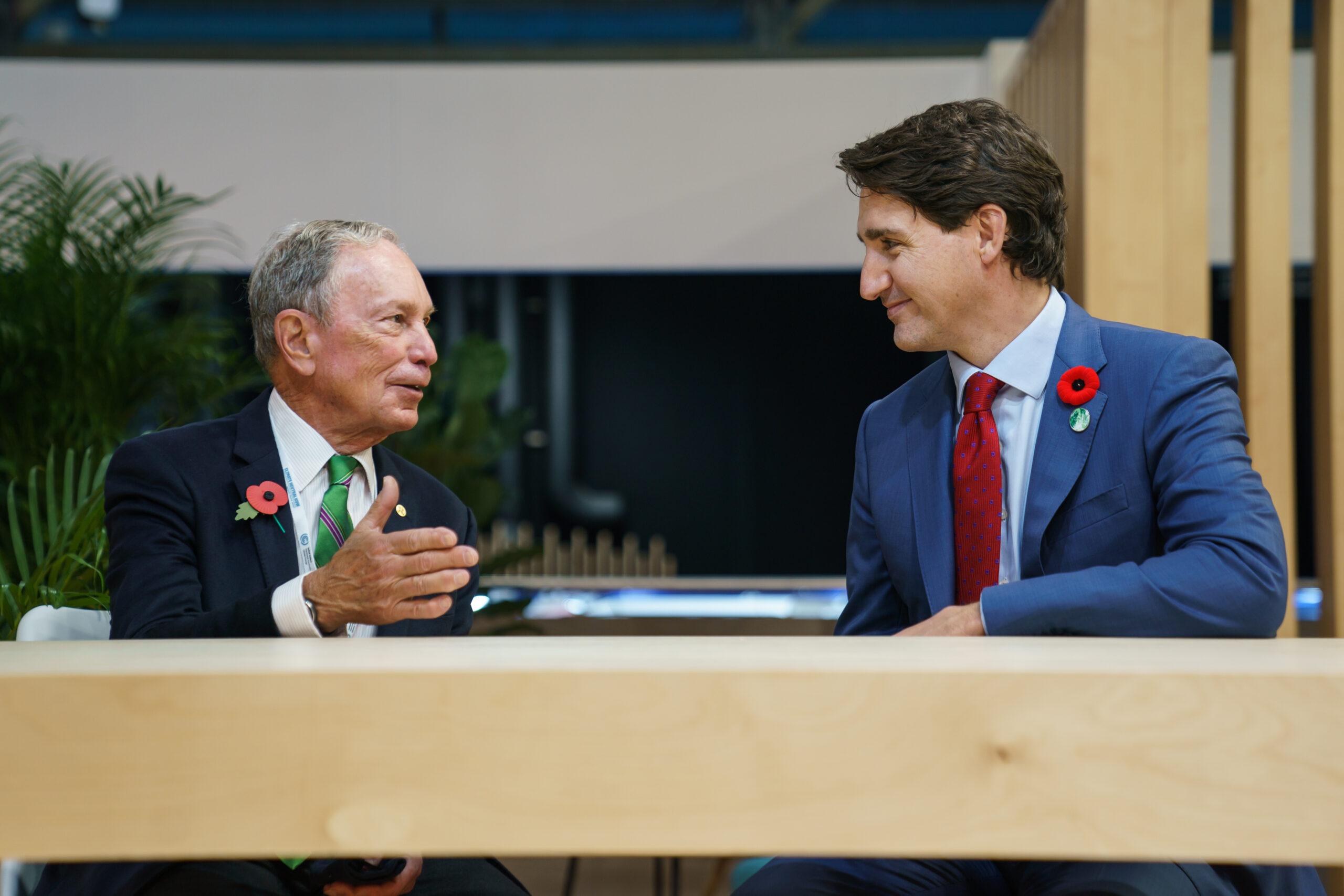 Prime Minister Justin Trudeau speaks with Michael Bloomberg at COP26 in Glasgow on Nov. 1, 2021.