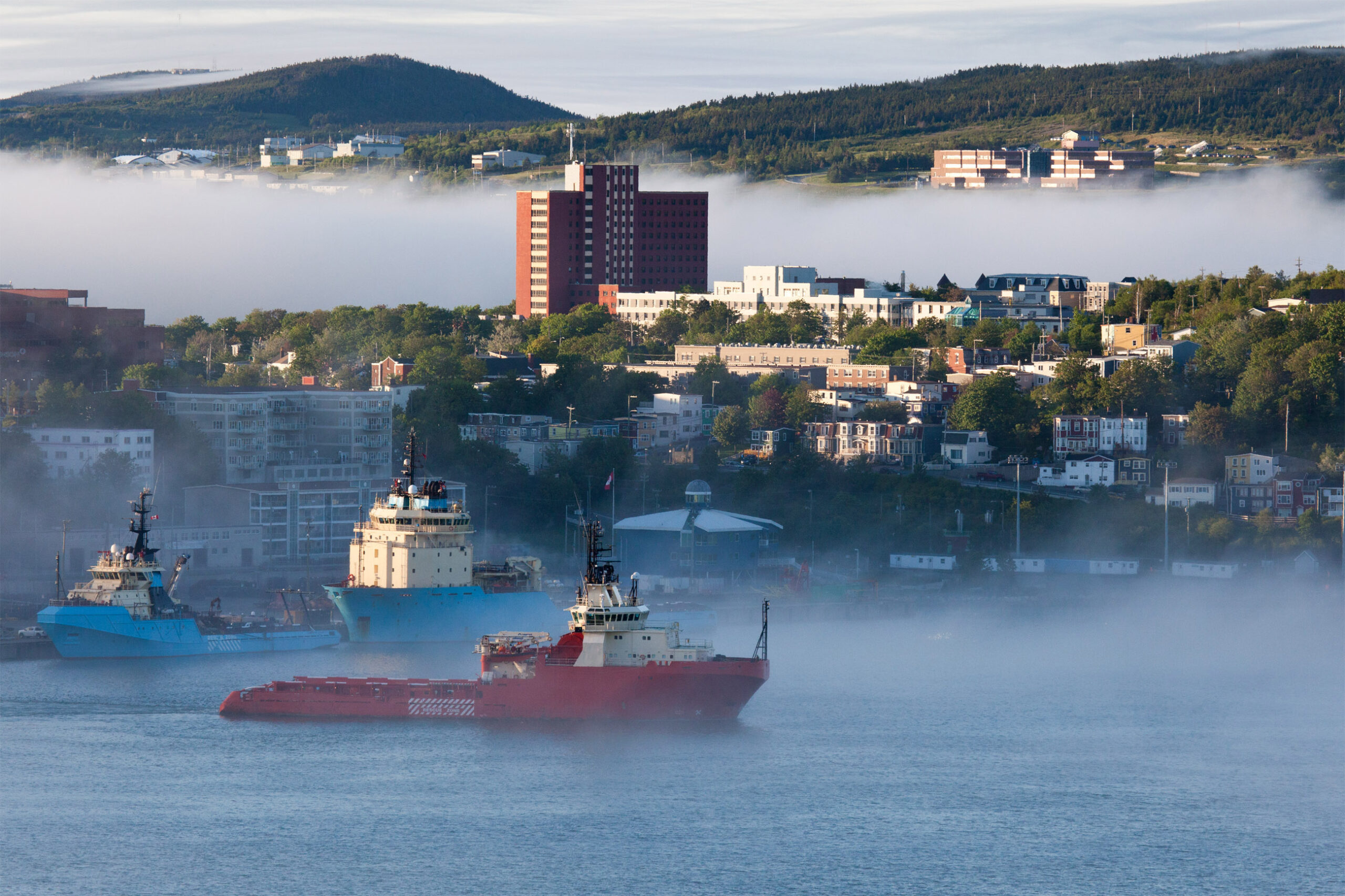 Offshore oil and gas supply ship in St. John's harbour in fog