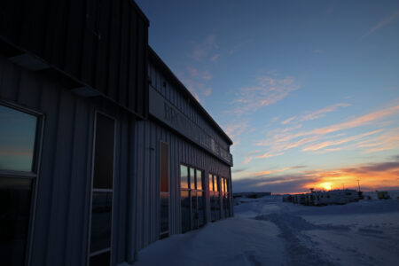 Snowbanks outside the Browns' family business that closed after contamination at a neighbouring Imperial Oil site