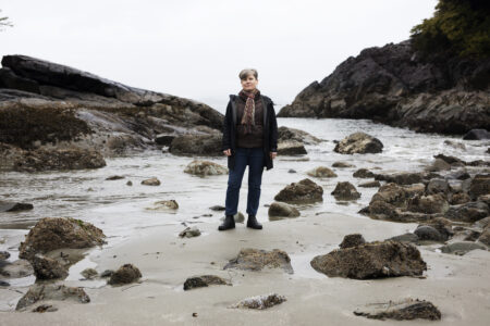 Josie Osborne, Minister of Land, Water and Resource Stewardship and minister responsible for fisheries, stands on MacKenzie Beach, in Tofino, B.C., Tla-o-qui-aht territory.