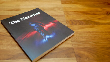 The Narwhal's 2022 print magazine is seen on a table.