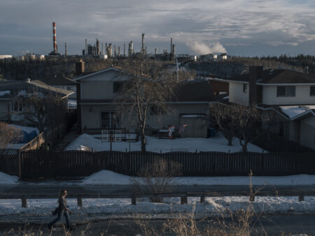 The Imperial Oil refinery near Edmonton, with residential homes in the foreground.