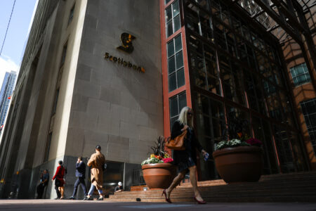 People walk past Scotia Plaza in Toronto on Sept. 29, 2021.
