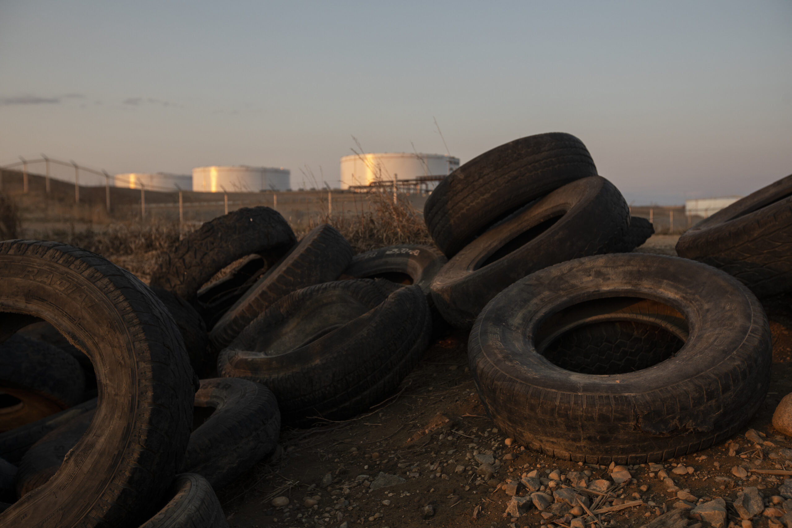 Tires in the ditch near a train crossing at the Husky Midstream North terminal near Hardisty, Alberta on April 24, 2022