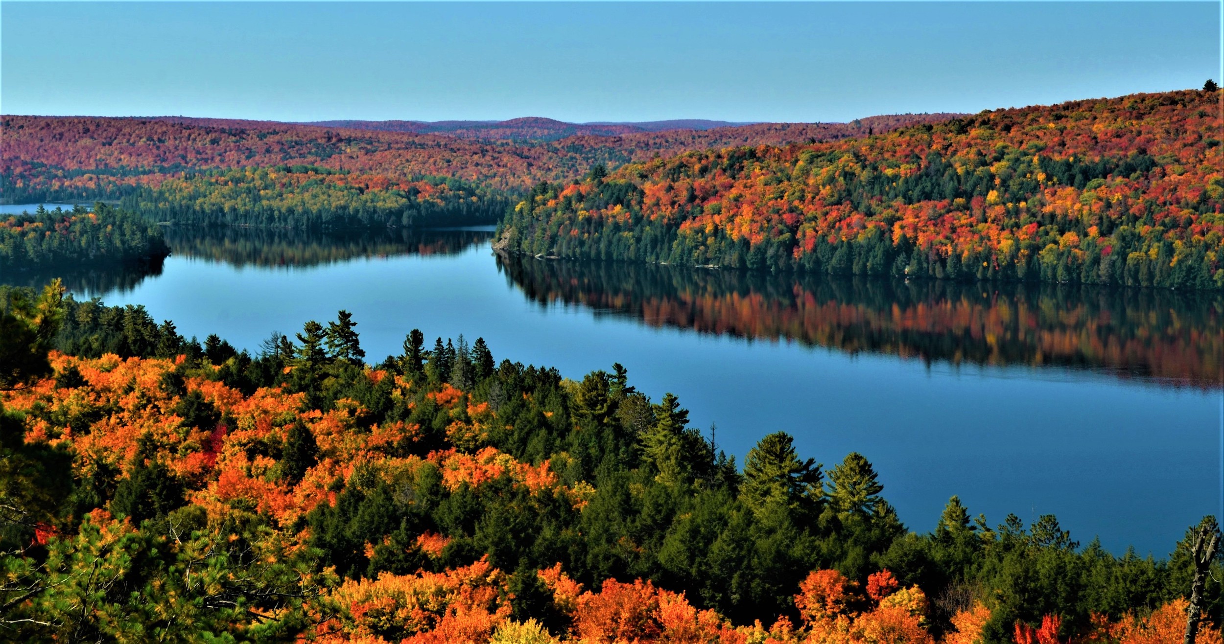 The beautiful colors of Autumn around Rock Lake in Algonquin Provincial Park, Ontario, Canada.