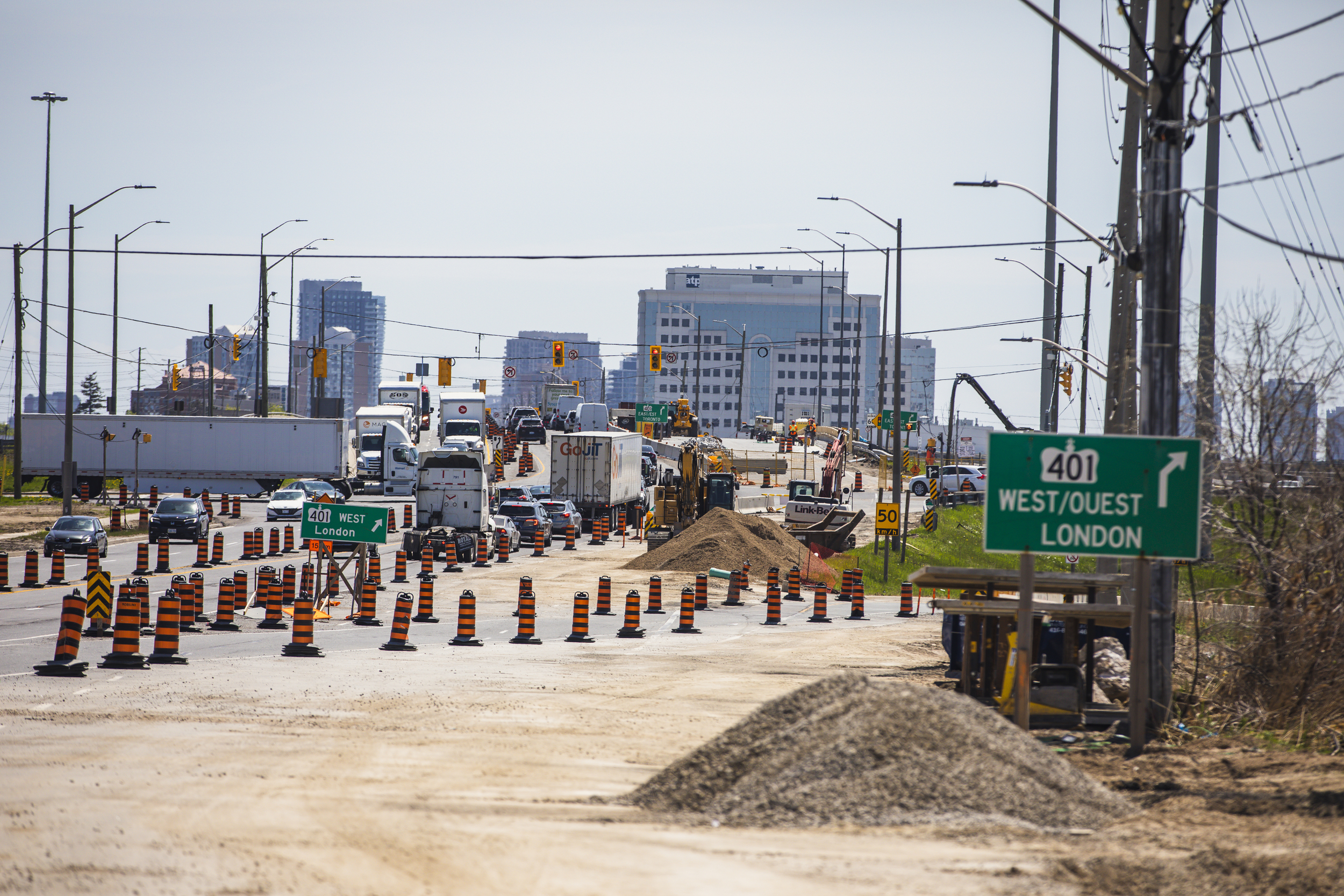 Cars and trucks make their way through a construction zone in southwestern Ontario.