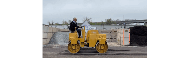 A gif of Doug Ford backing up in a construction vehicle.
