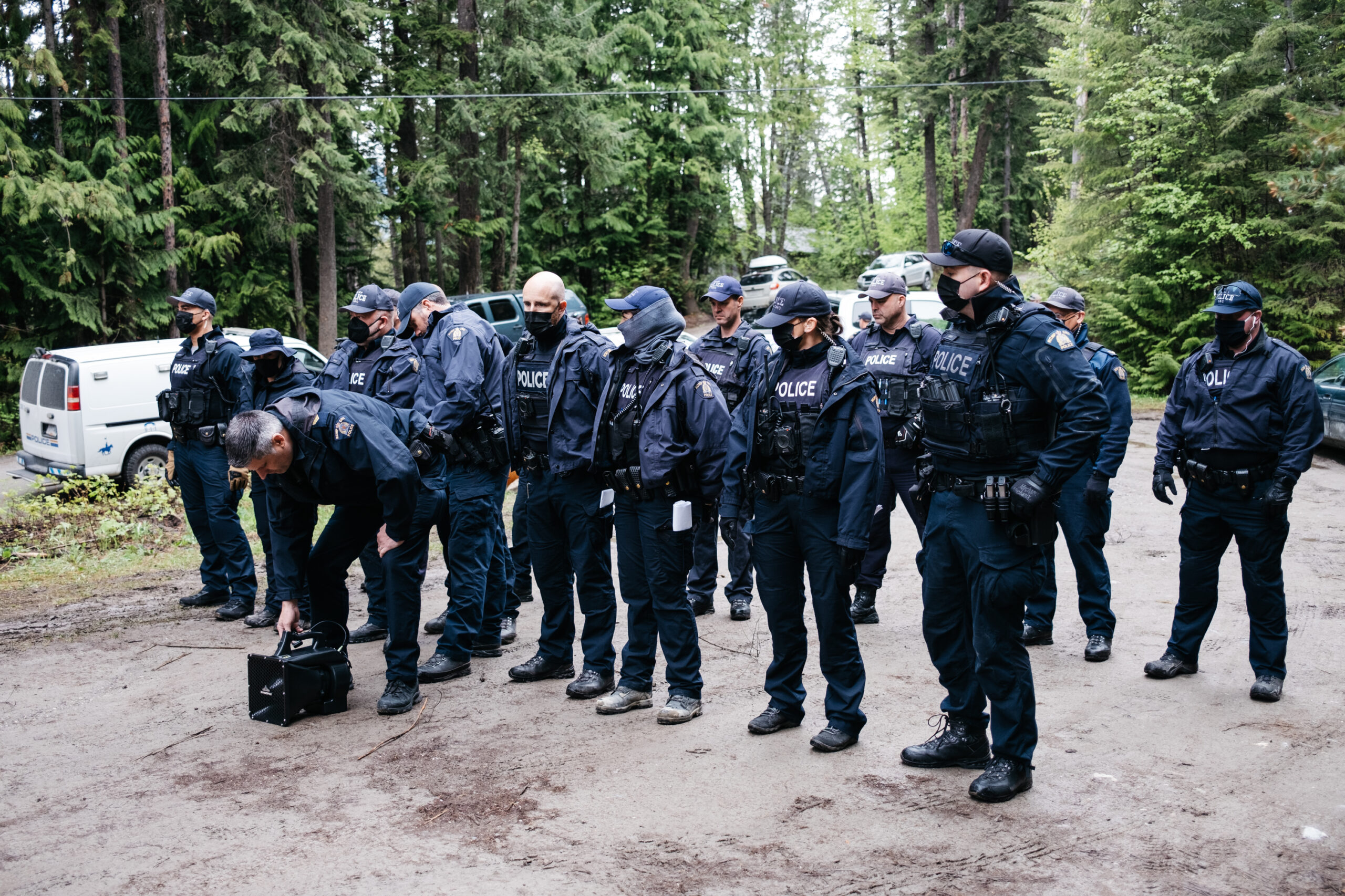 The RCMP’s Community Industry Response Group plays a recorded message on a loudspeaker to protesters at the bottom of the Salisbury Forestry Service Road between the rural communities of Argenta and Johnsons Landing.