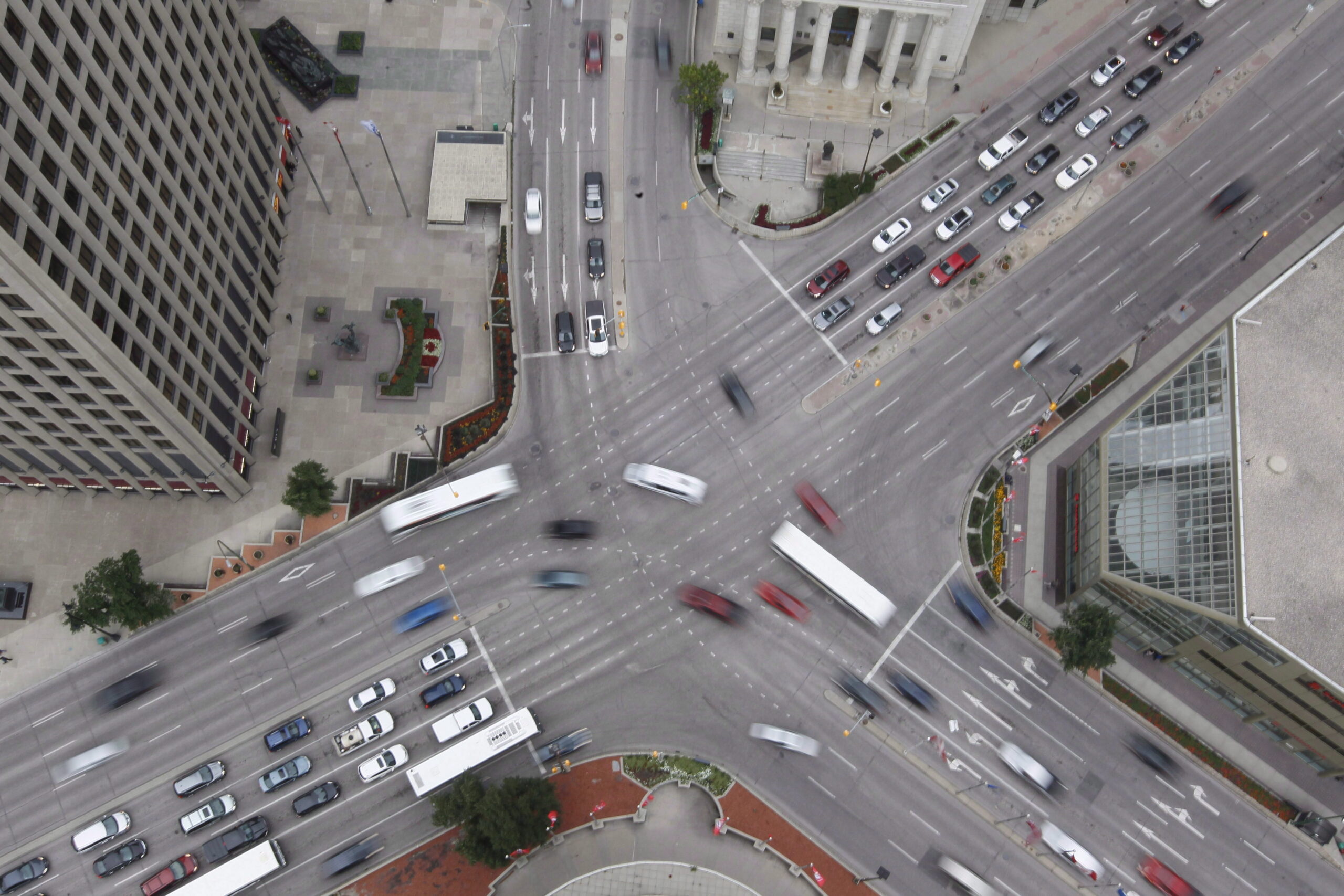 aerial photo of cars driving through Portage and Main intersection