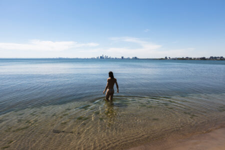 A man at the beach at Hanlan's Point in Toronto.