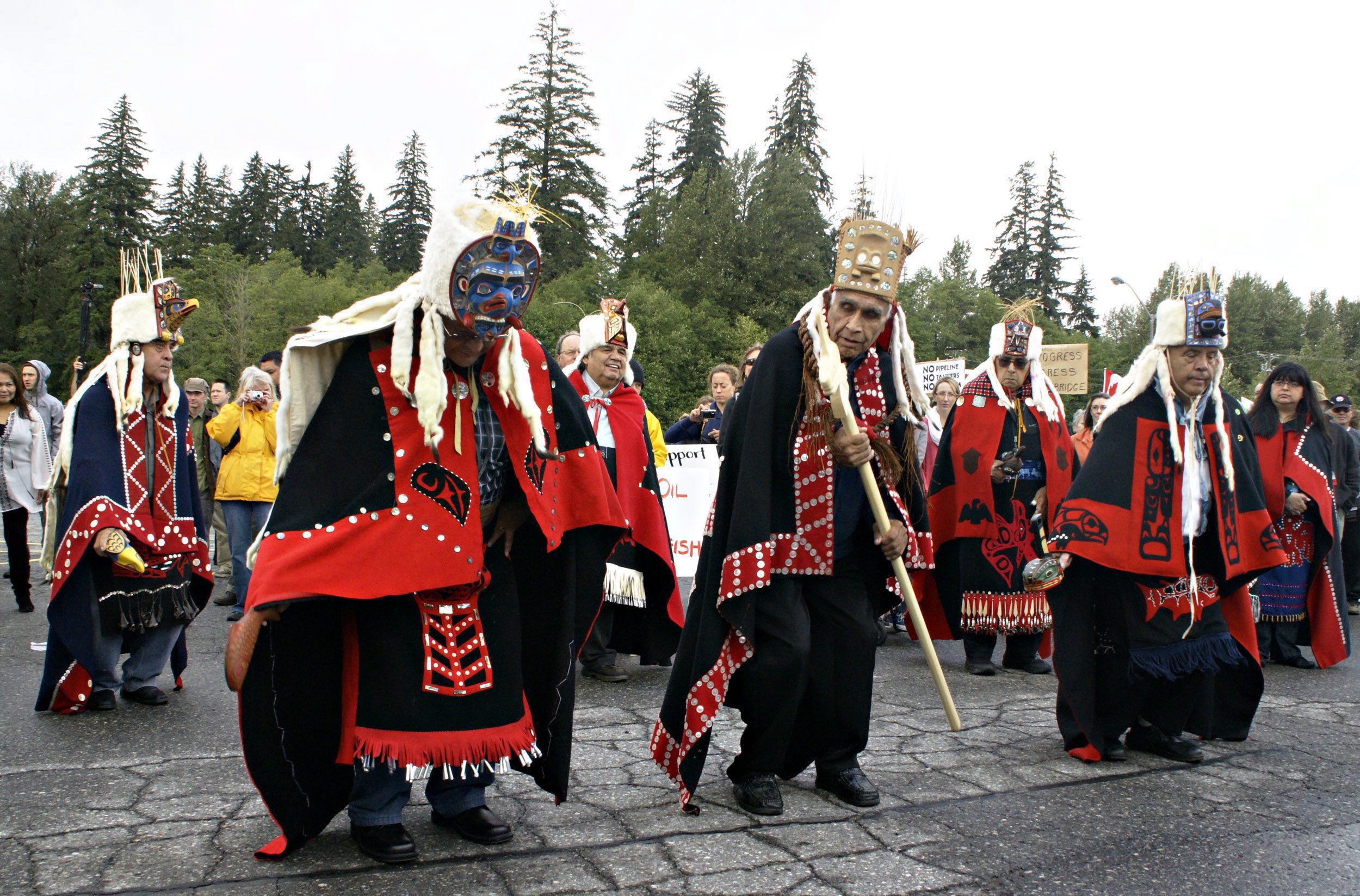 Traditional chiefs from the Heilsuk First Nation in Bella Bella, BC, lead a protest rally with a dance in Kitimat, BC, Tuesday, August 31, 2010.
