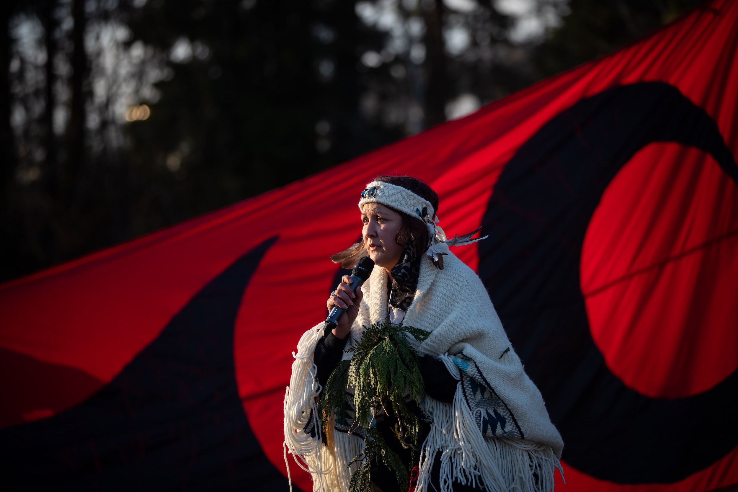 Roxanne Charles-George, of the Semiahmoo First Nation, speaks as protesters opposed to the Trans Mountain Pipeline expansion project gather at a park just below a construction site at the company's Burnaby Terminal tank farm in Burnaby, B.C., on Wednesday, March 10, 2021.