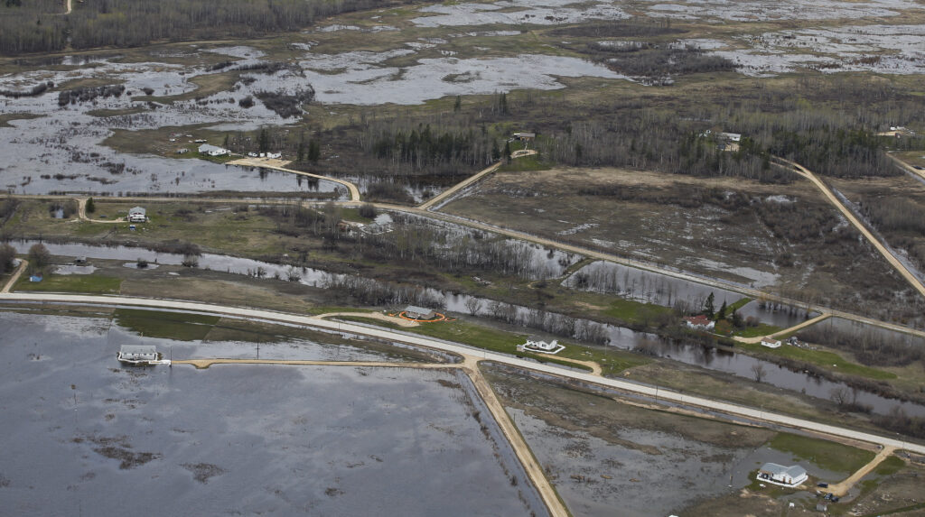 Aerial view of floodwater surrounding homes in Peguis First Nation during the peak of the flood