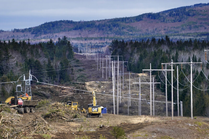 Heavy machinery is used to cut trees to widen an existing Central Maine Power power line corridor to make way for new utility poles, April 26, 2021