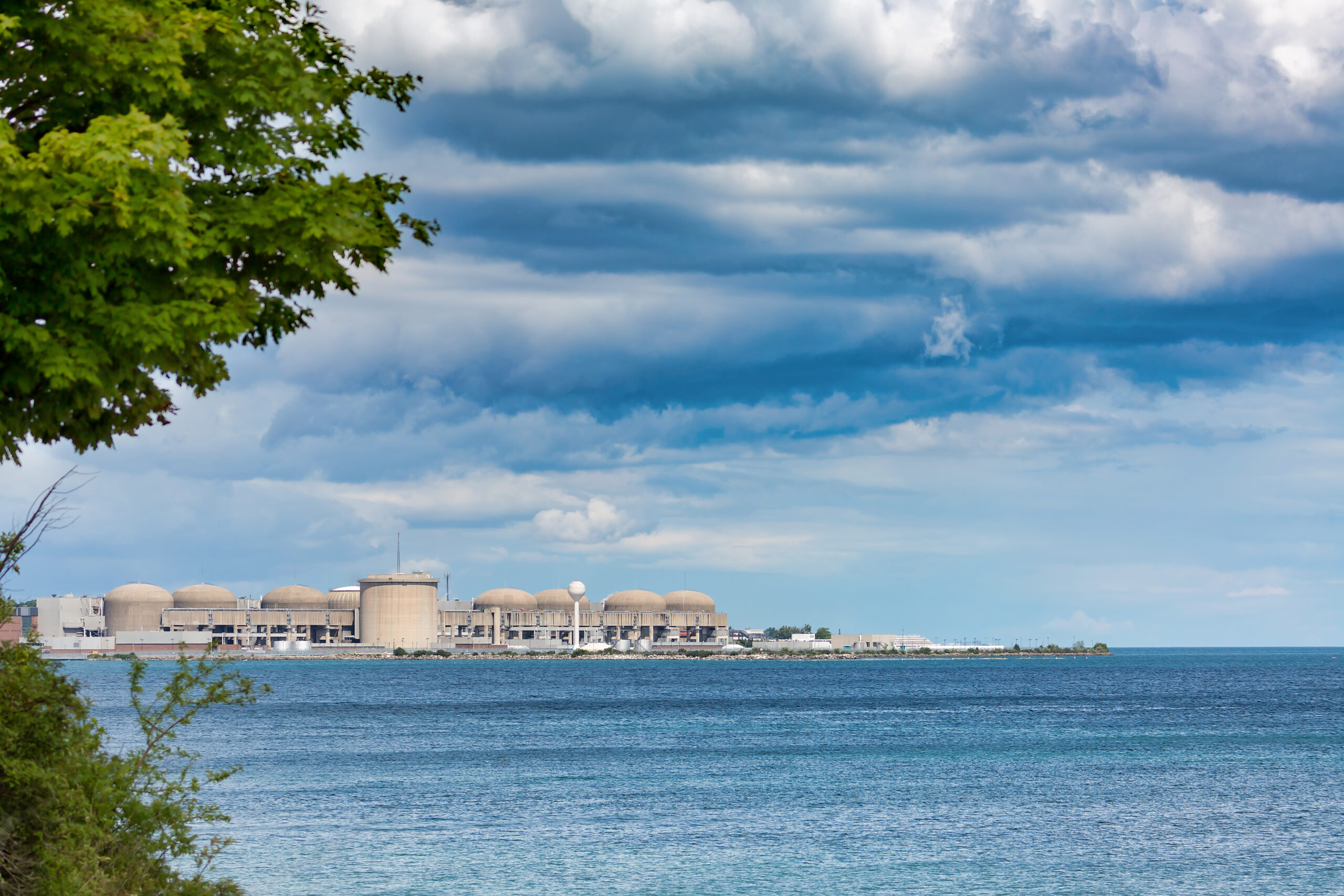 Pickering Nuclear Generating Station visible across a body of water