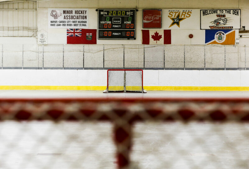 Hockey nets, scoreboard and banners at West Kildonan Memorial Community Centre arena on Perth Avenue in Winnipeg.