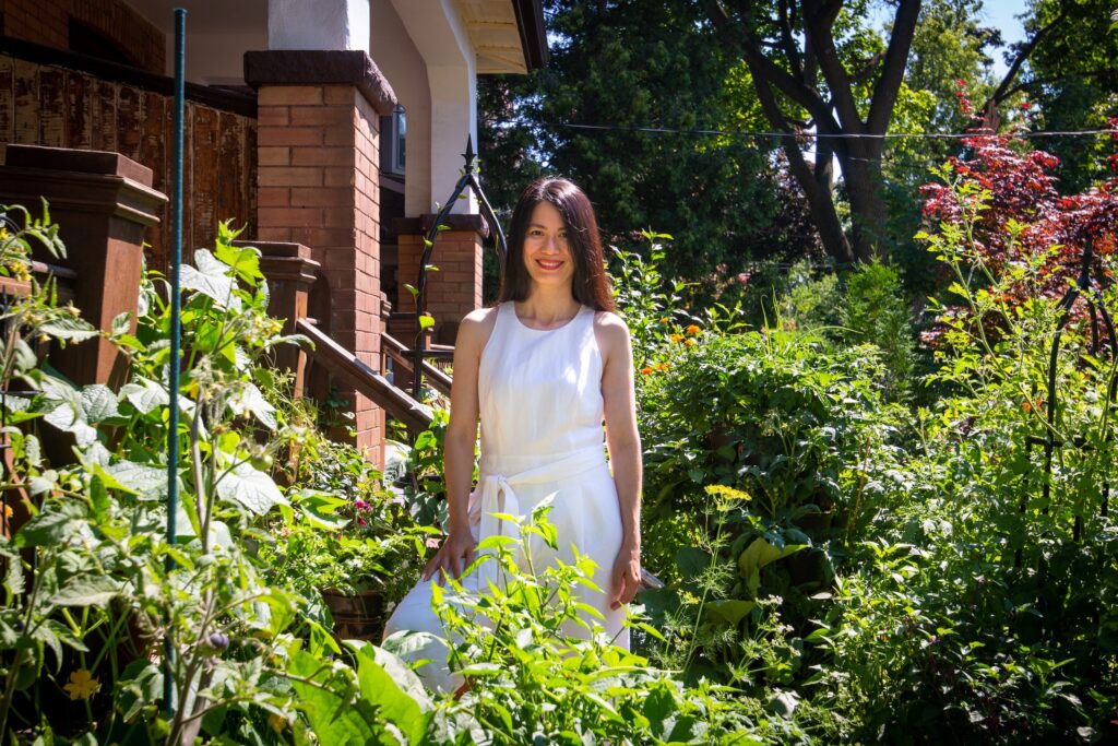 Mary Vo in her front yard food garden in Toronto.