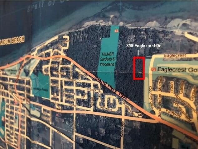 A photo of the proposed development site shows the zone’s proximity to key ecological pockets of the Qualicum Beach greenbelt.