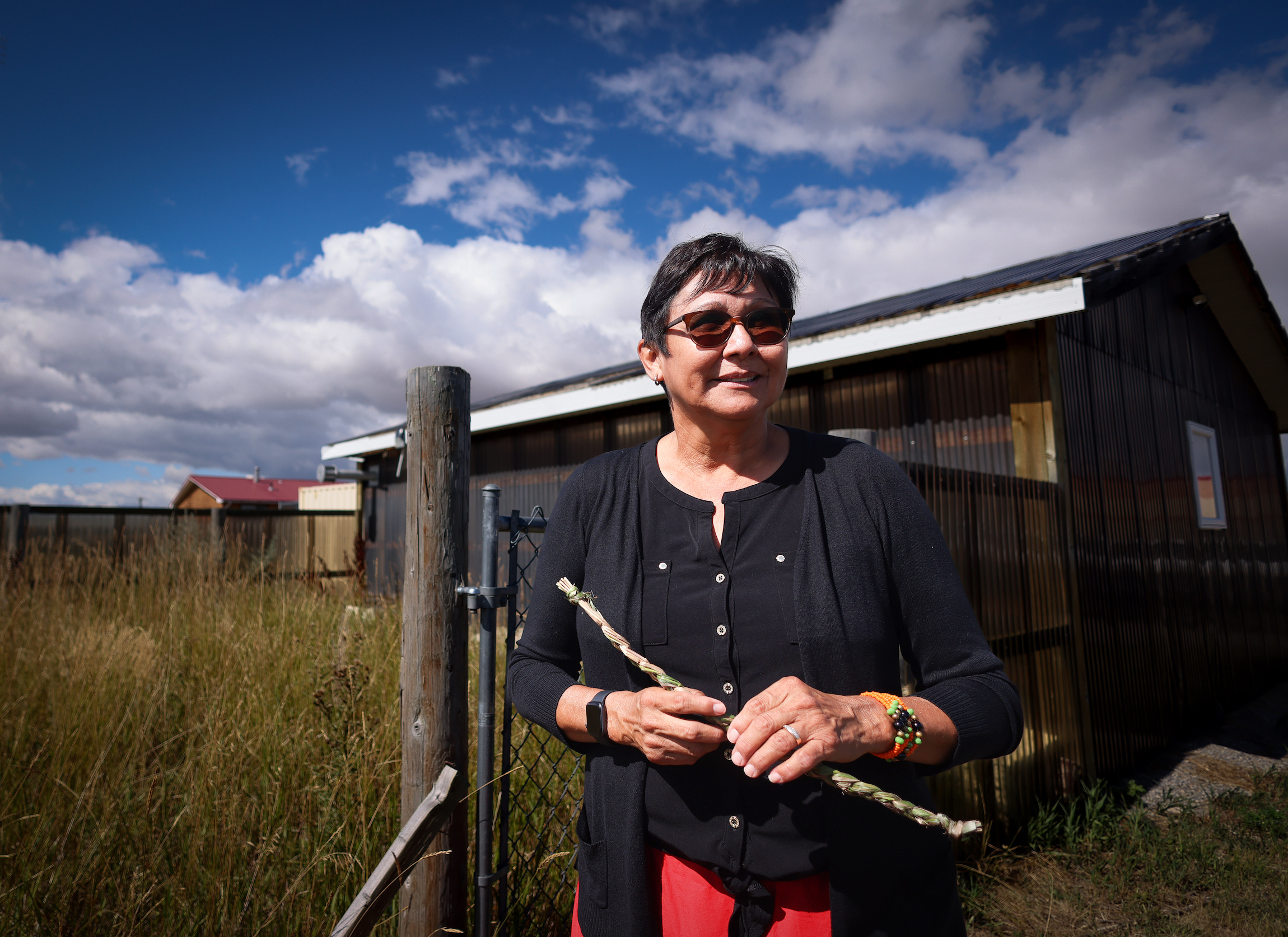 Woman standing outside on Piikani Nation