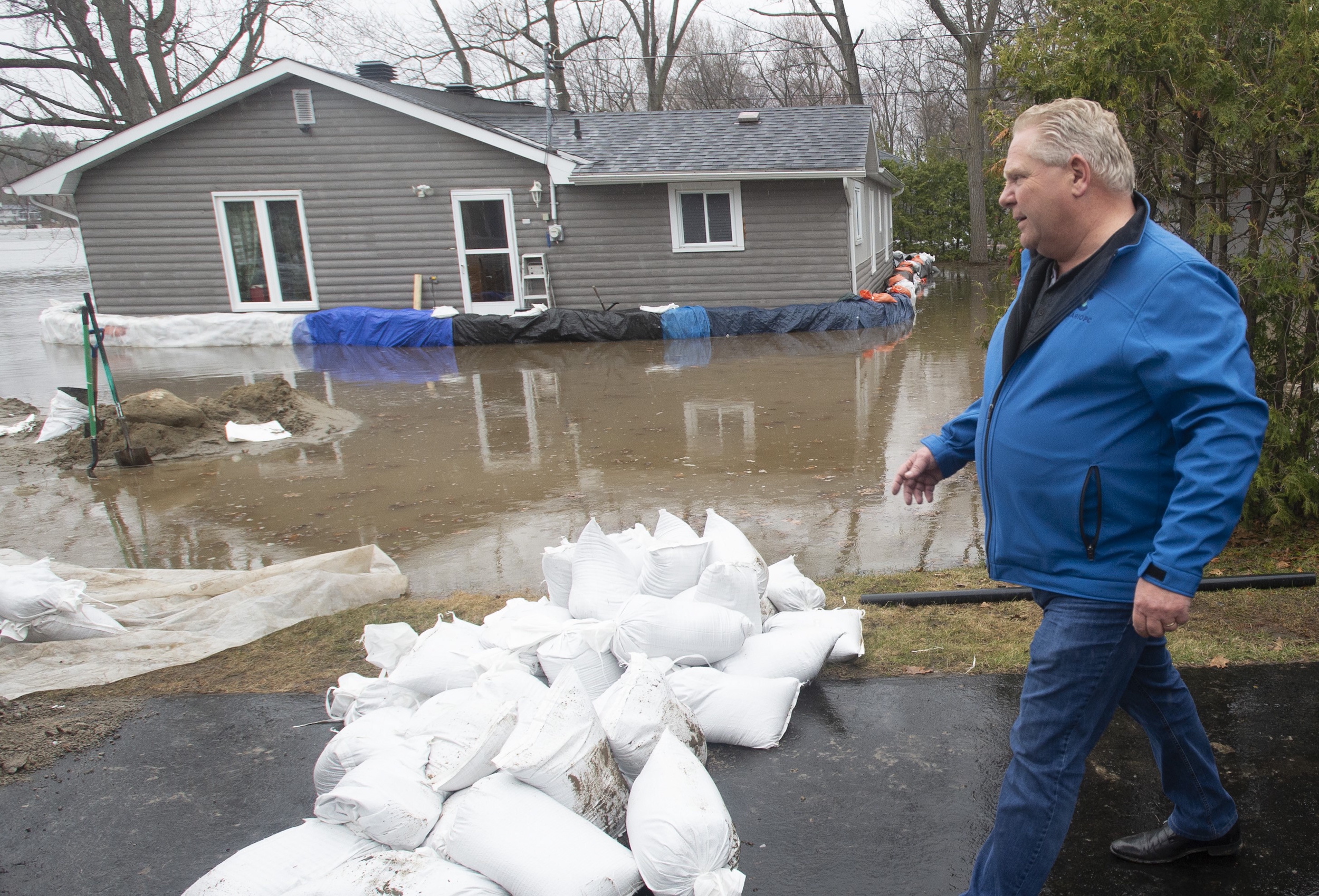 Ontario Premier Doug Ford surveys flooded areas on Friday, April 26, 2019 in Ottawa.