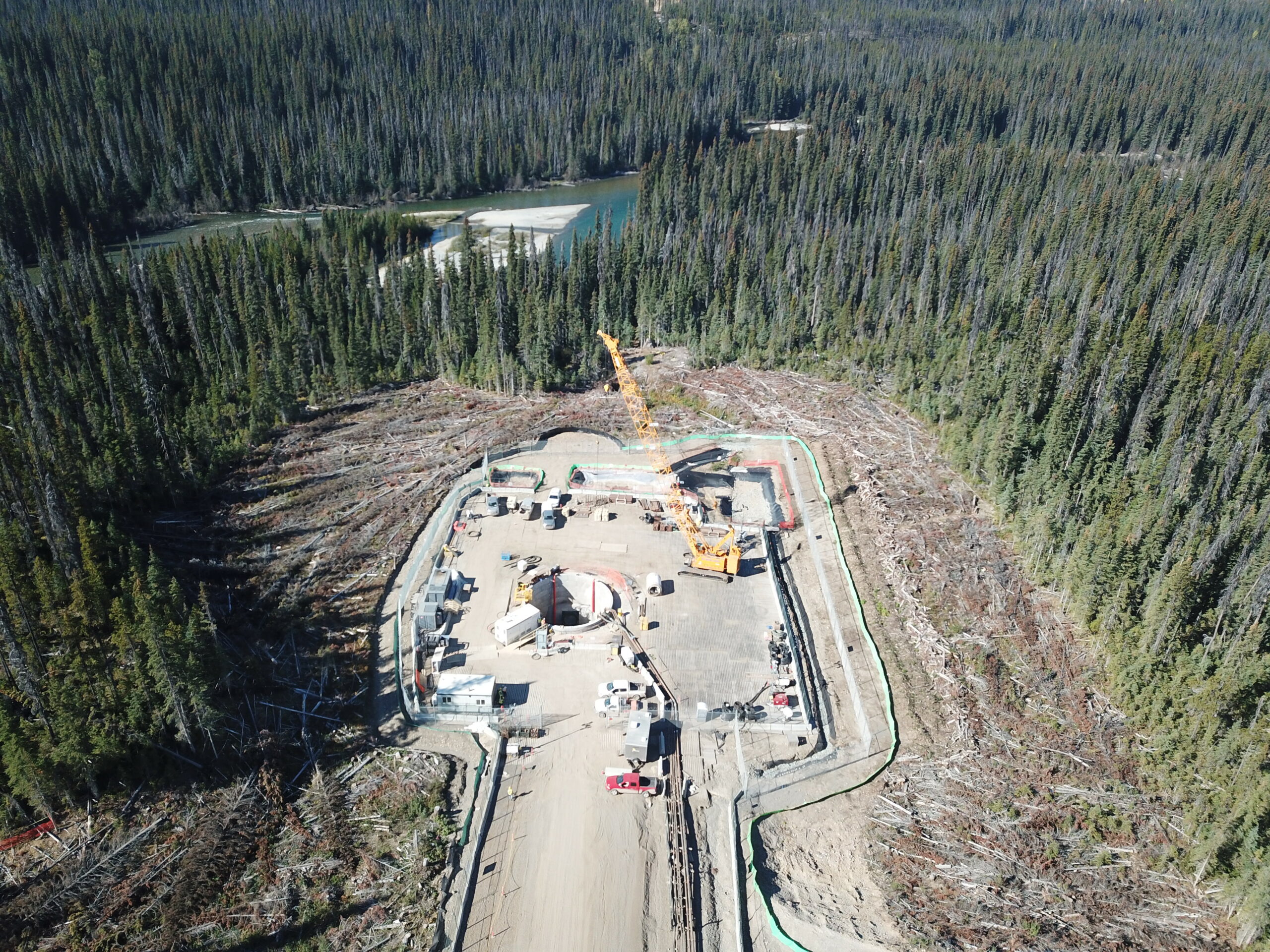 Drone image of the Coastal GasLink drill site with the Wedzin Kwa (Morice River) 