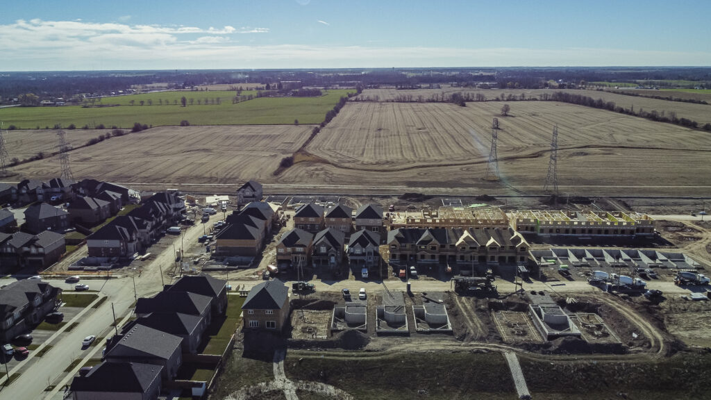 An aerial view of a new subdivision in Stoney Creek, Ont., being built near farmland.