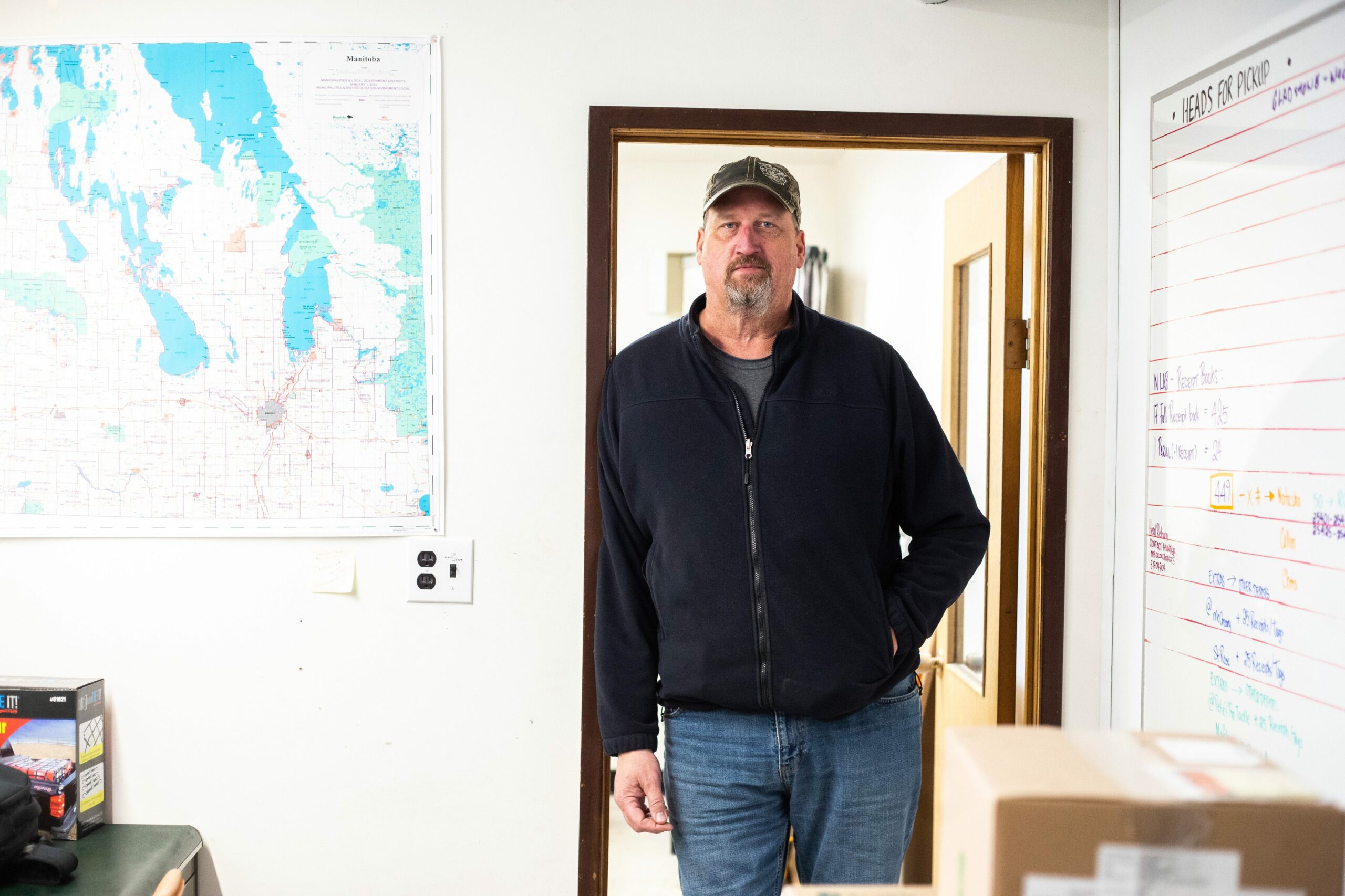 Manitoba wildlife health biologist Richard Davis stands in the doorway of his office in the province's wildlife health laboratory