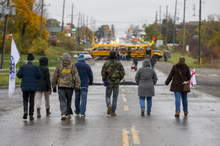 Land defenders and supporters at a land reclamation camp known as 1492 Land Back Lane near Six Nations of the Grand River.
