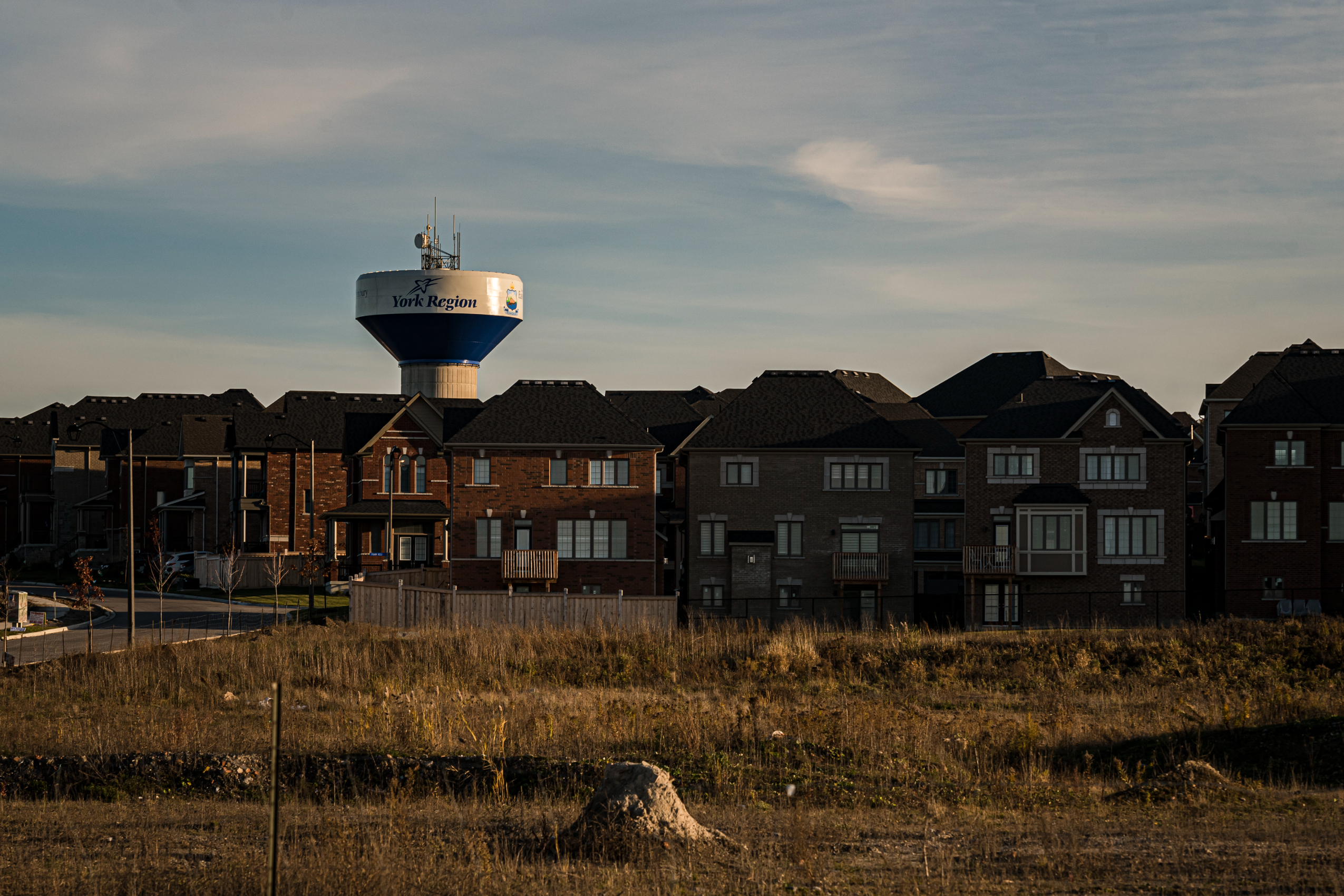 Tightly packed suburbs with a York Region water tower