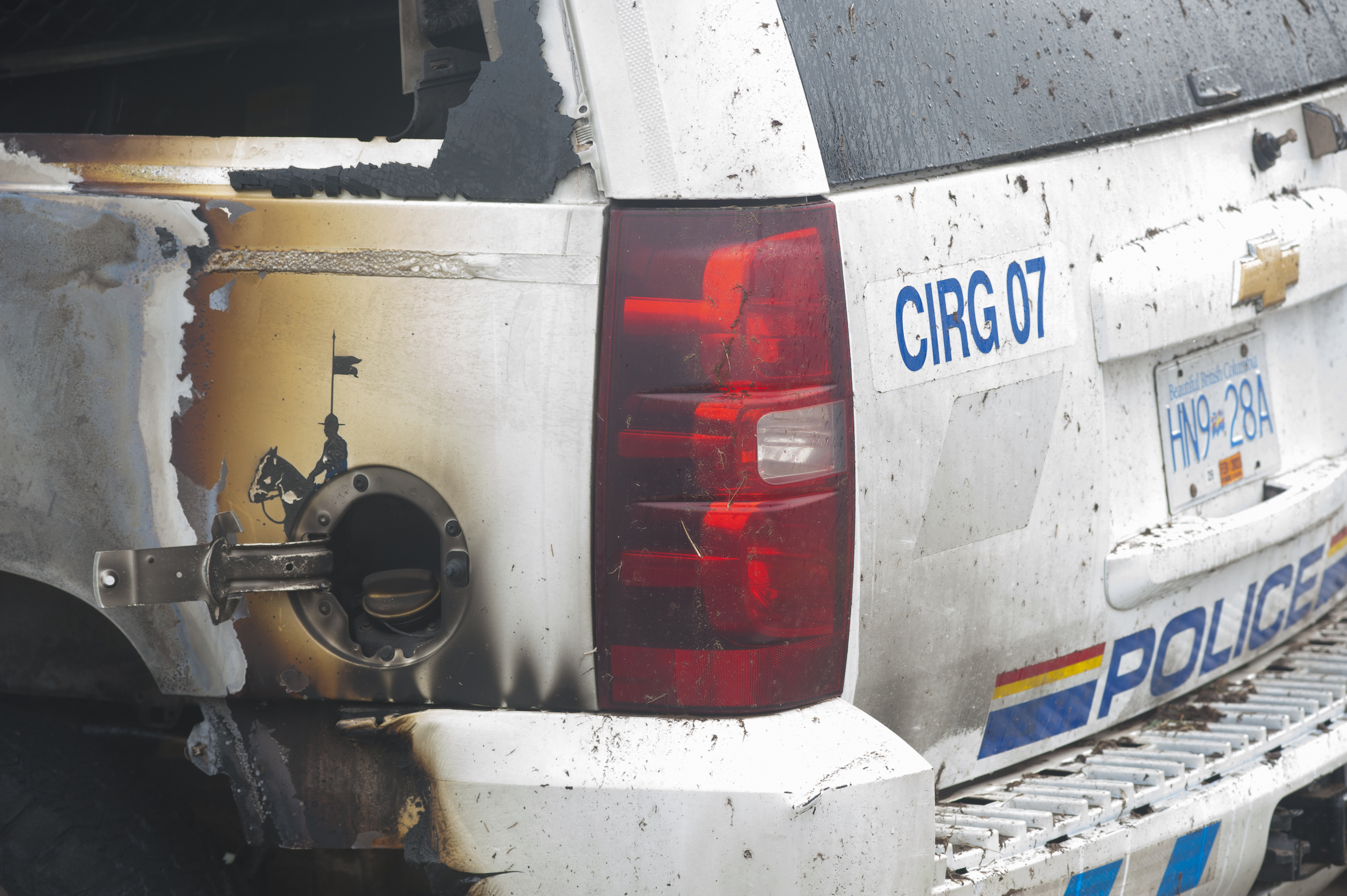 A burned RCMP vehicle with the sticker "CIRG 07" indicating it belongs to the controversial Community-Industry Response Group, a special unit assigned to police opposition to industrial projects