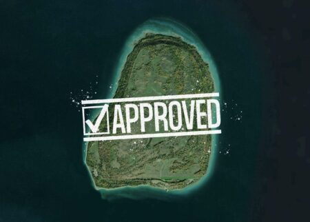 A satellite image of Griffith island with an illustrated check mark and the word "approved" stamped on it