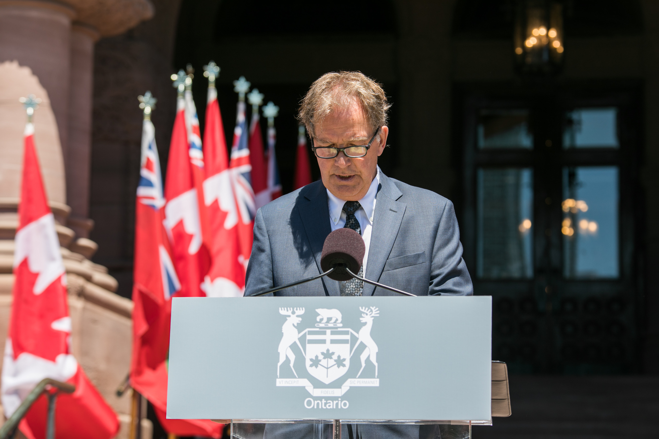 Ontario Minister of Mines George Pirie speaks at a podium